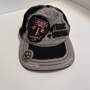 Ripleys believe it or not cap with build in bottle opener  Red Skull Design